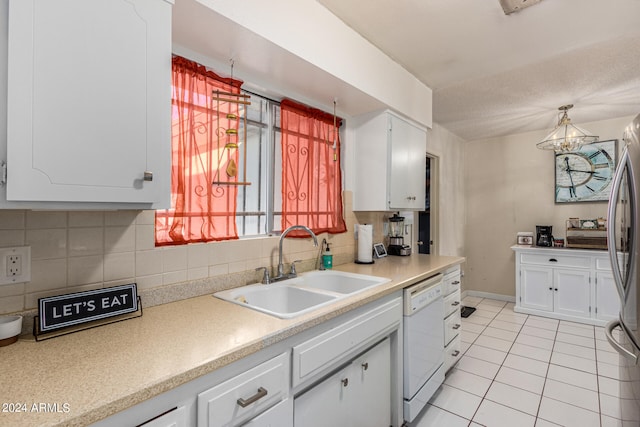 kitchen with white cabinetry, a notable chandelier, dishwasher, and pendant lighting