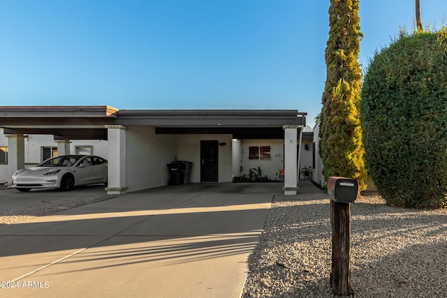 view of front of house with a carport