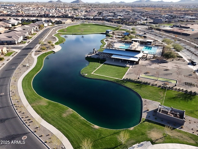 bird's eye view with a residential view and a water and mountain view