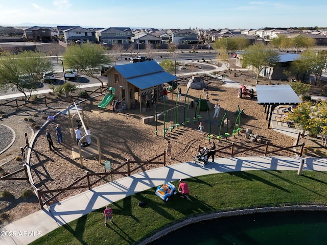 birds eye view of property with a residential view