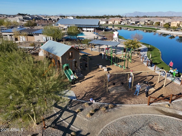 aerial view featuring a residential view and a water view