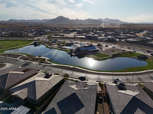 bird's eye view featuring a residential view and a water and mountain view