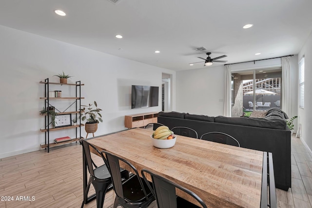 dining space with light wood-style floors, visible vents, a ceiling fan, and recessed lighting