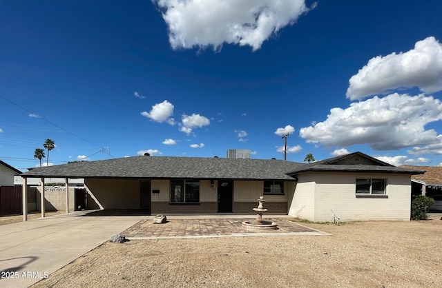 1532 W 6th St, Tempe, AZ 85281 - single story home with a carport, brick siding, concrete driveway, and a shingled roof