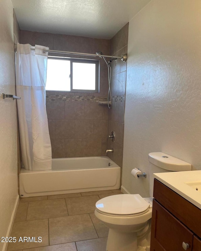 1532 W 6th St, Tempe, AZ 85281 - bathroom with vanity, shower / tub combo, toilet, tile patterned flooring, and baseboards