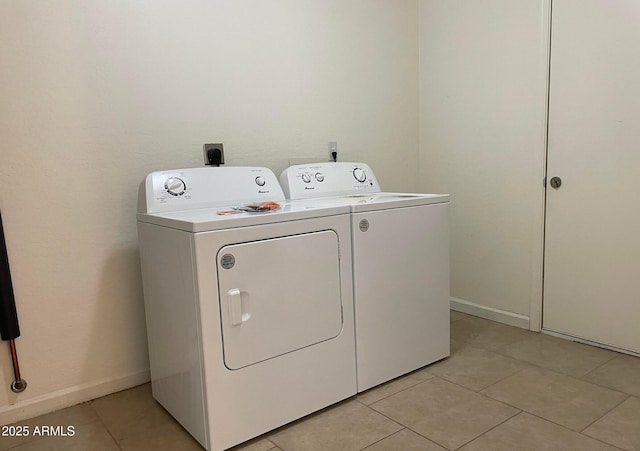 1532 W 6th St, Tempe, AZ 85281 - washroom featuring separate washer and dryer, light tile patterned floors, and baseboards