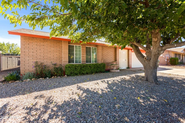 ranch-style home with a garage