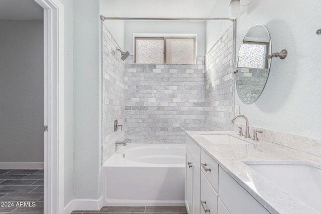 bathroom with a bathtub and vanity