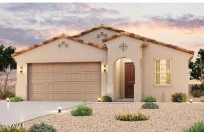 mediterranean / spanish-style house featuring a garage