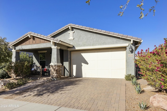 view of front of property featuring a garage