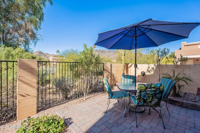 view of patio featuring a mountain view