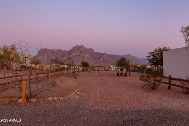 yard at dusk with a mountain view