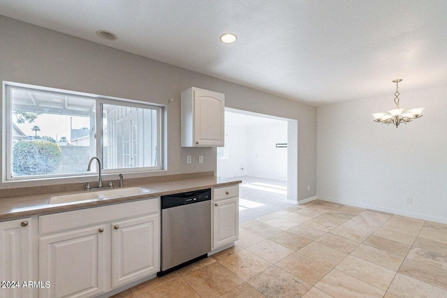 kitchen featuring stainless steel dishwasher, sink, an inviting chandelier, white cabinets, and hanging light fixtures