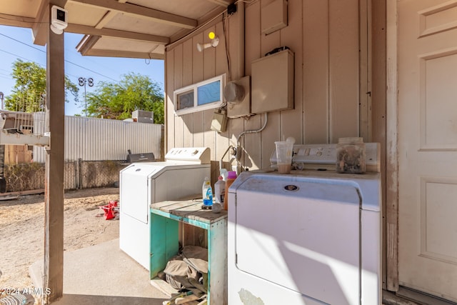 laundry room featuring washing machine and dryer