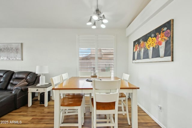 dining room with hardwood / wood-style floors