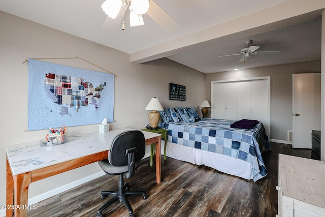 bedroom featuring a closet, ceiling fan, and dark hardwood / wood-style floors