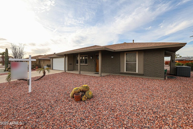 single story home with a garage