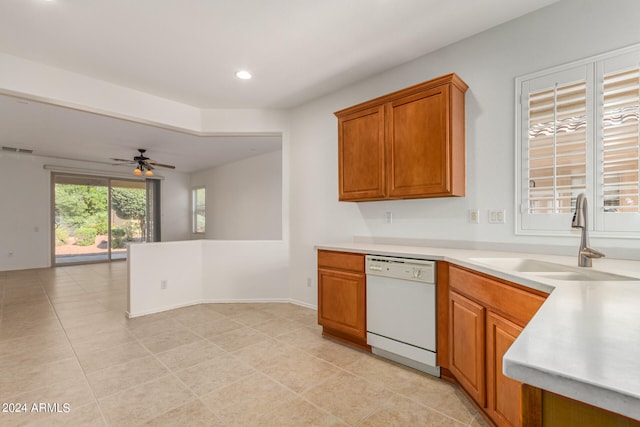 kitchen with ceiling fan, white dishwasher, sink, and light tile patterned flooring