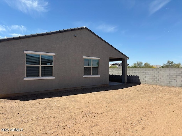 16084 W Prickly Pear Trl, Surprise, AZ 85387 - rear view of house featuring fence