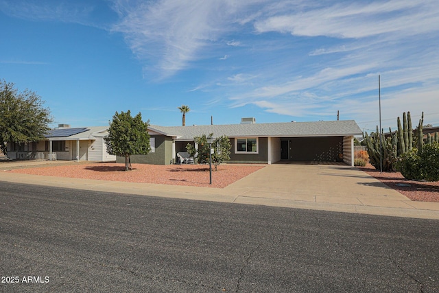 view of front of home with solar panels