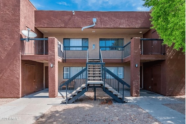view of property with stairs