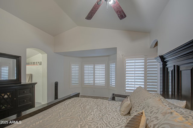 bedroom with ceiling fan and vaulted ceiling