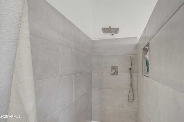 bathroom featuring a shower with curtain