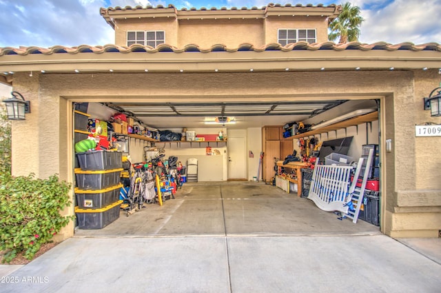 garage featuring a garage door opener