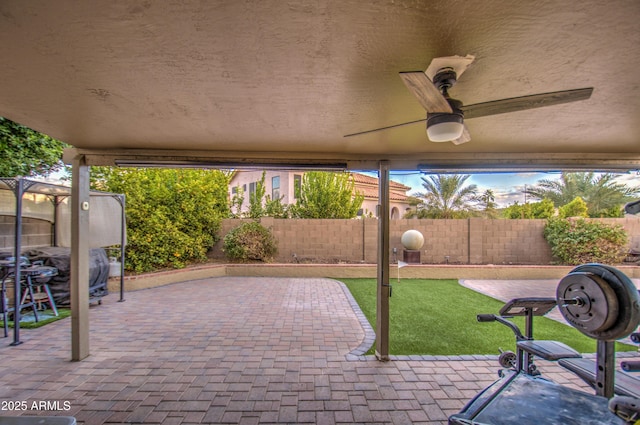 view of patio / terrace with ceiling fan