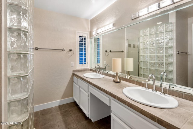 bathroom featuring vanity and tile patterned flooring