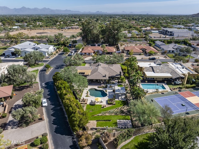 birds eye view of property featuring a mountain view