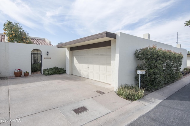 garage with driveway