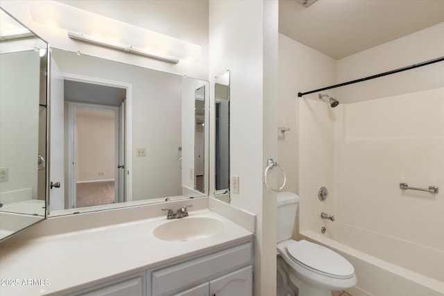 full bath featuring toilet, vanity, and bathing tub / shower combination