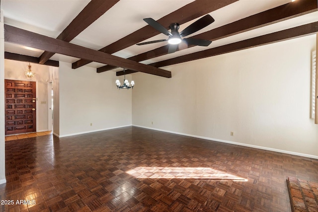 spare room with ceiling fan with notable chandelier, beamed ceiling, and baseboards