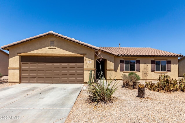 40264 W Lococo St, Maricopa, AZ 85138 - single story home featuring an attached garage, stucco siding, driveway, and a tiled roof