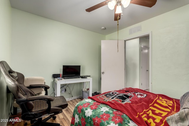 40264 W Lococo St, Maricopa, AZ 85138 - bedroom with a ceiling fan, wood finished floors, and visible vents