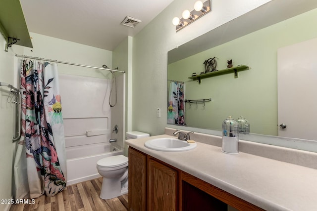 40264 W Lococo St, Maricopa, AZ 85138 - full bathroom with visible vents, shower / tub combo with curtain, vanity, wood finished floors, and toilet