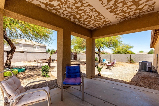 40264 W Lococo St, Maricopa, AZ 85138 - view of patio featuring a fenced backyard and cooling unit