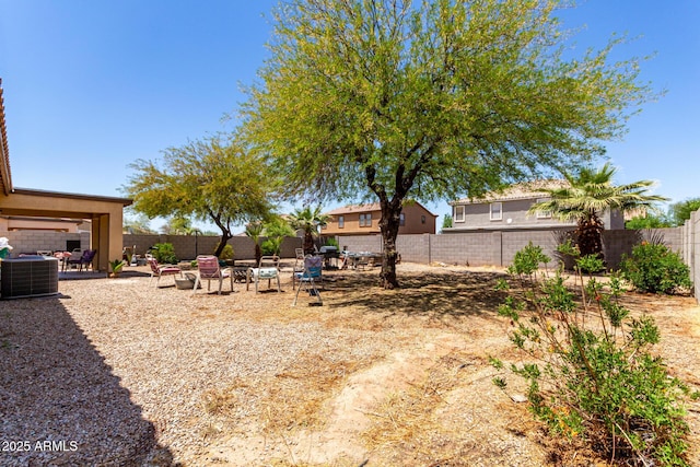 40264 W Lococo St, Maricopa, AZ 85138 - view of yard featuring a fenced backyard, a patio, and central AC
