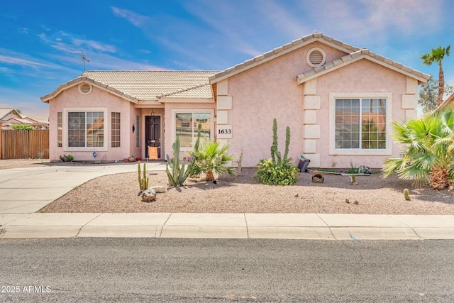 1633 E Jasmine St, Casa Grande, AZ 85122 - single story home featuring fence, stucco siding, and a tile roof