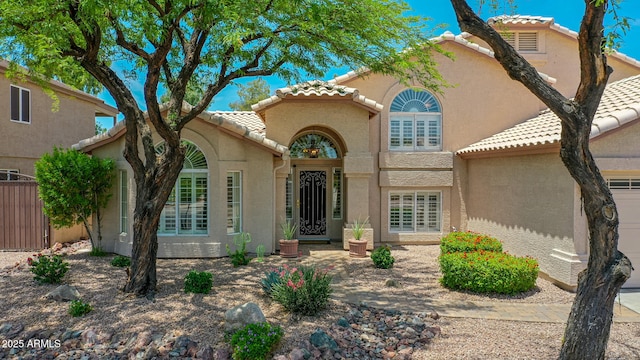 19506 N 73rd Ave, Glendale, AZ 85308 - mediterranean / spanish-style house featuring a tile roof and stucco siding