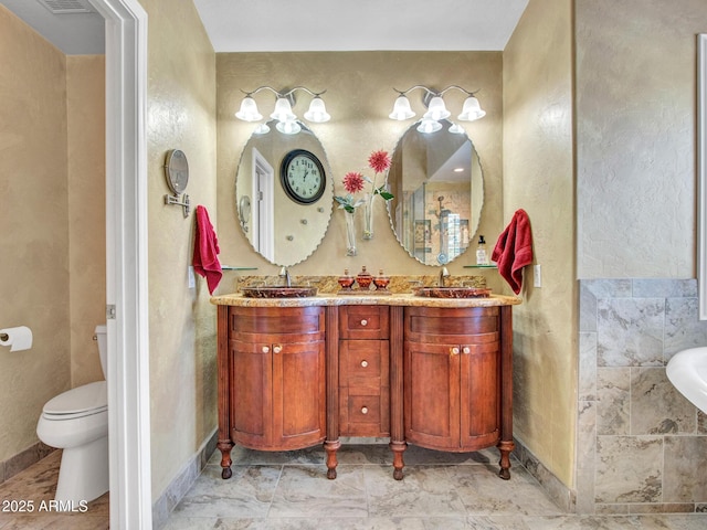 19506 N 73rd Ave, Glendale, AZ 85308 - bathroom featuring double vanity and toilet