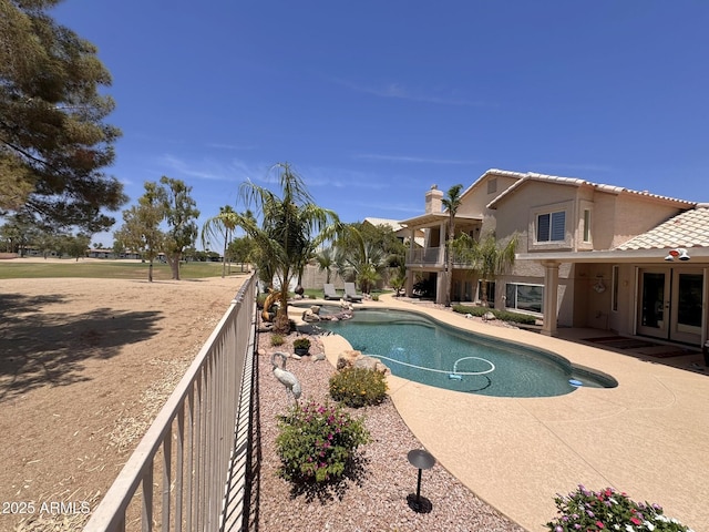 19506 N 73rd Ave, Glendale, AZ 85308 - view of pool featuring french doors, a patio area, and a pool with connected hot tub
