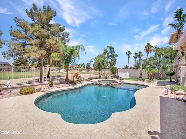 19506 N 73rd Ave, Glendale, AZ 85308 - view of swimming pool featuring a fenced backyard, a pool with connected hot tub, and a patio