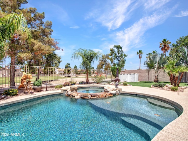 19506 N 73rd Ave, Glendale, AZ 85308 - view of swimming pool with a fenced backyard and a pool with connected hot tub