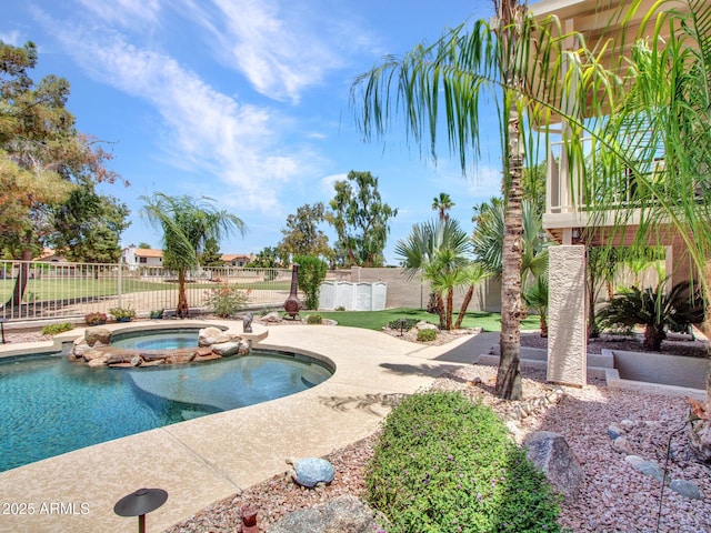 19506 N 73rd Ave, Glendale, AZ 85308 - view of swimming pool with a fenced backyard, a pool with connected hot tub, and a patio area