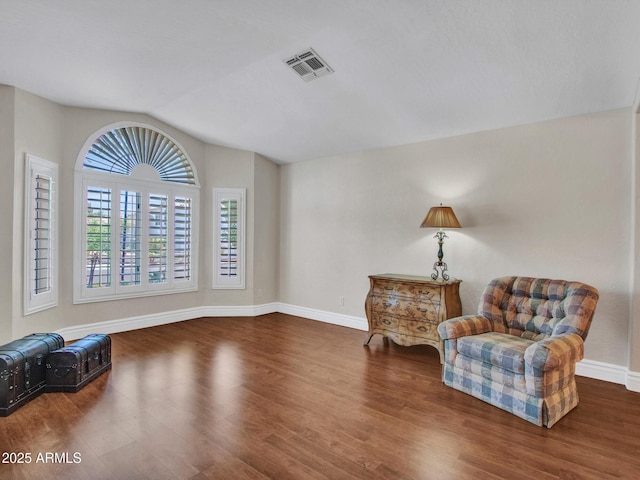 19506 N 73rd Ave, Glendale, AZ 85308 - living area with vaulted ceiling, wood finished floors, and baseboards
