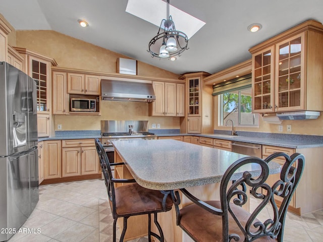 19506 N 73rd Ave, Glendale, AZ 85308 - kitchen featuring appliances with stainless steel finishes, wall chimney exhaust hood, lofted ceiling, a sink, and light tile patterned floors