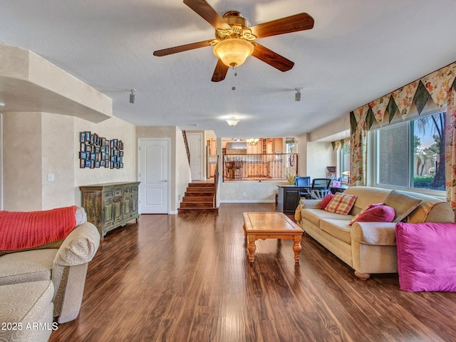 19506 N 73rd Ave, Glendale, AZ 85308 - living room featuring wood finished floors, stairs, ceiling fan, and a textured ceiling