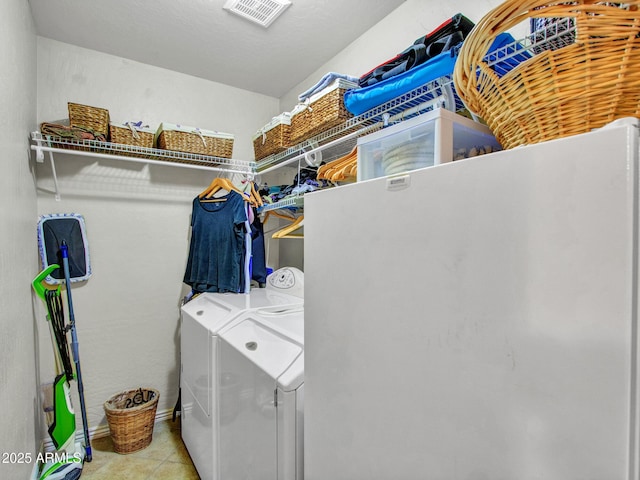 19506 N 73rd Ave, Glendale, AZ 85308 - laundry room featuring washer and clothes dryer and tile patterned floors